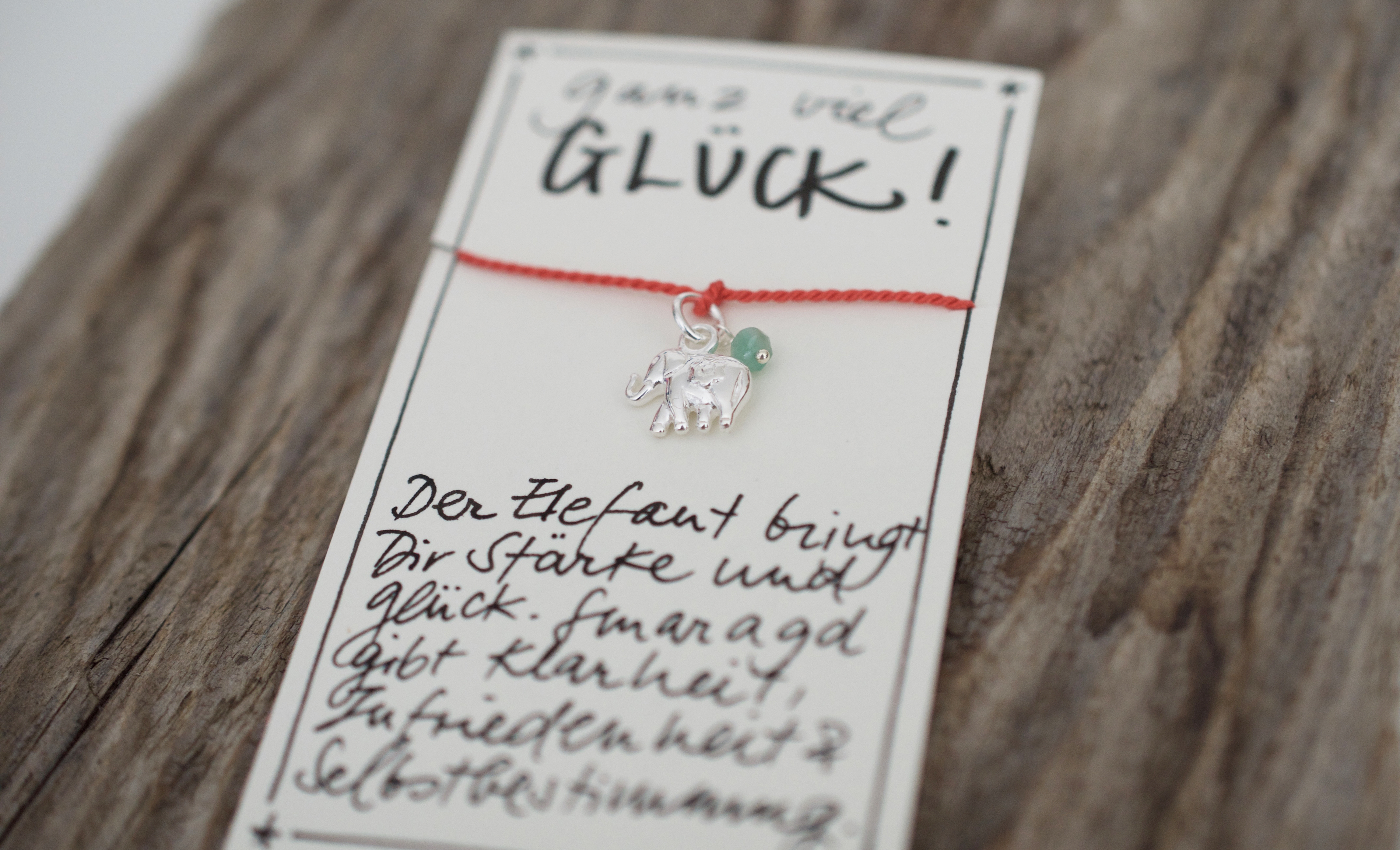Wunscharmband mit Elefant Charm und Smaragd aus Naturseide und 925 Silber